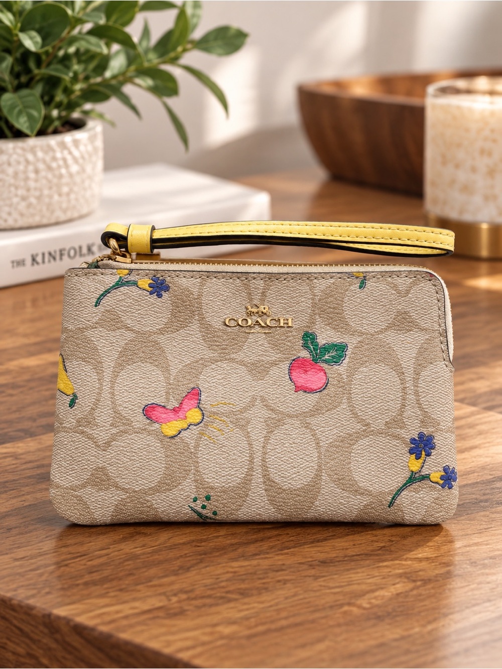 Coach Beige Signature Wristlet with Yellow Strap and Multicolor Floral Accents